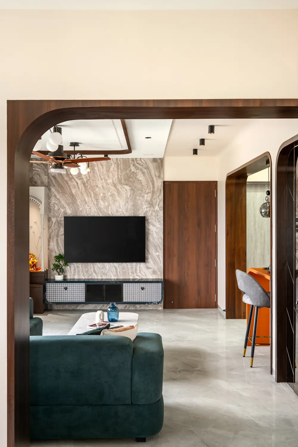Living room seen through a wooden arch